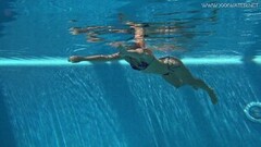 Naughty Mary Kalisy Russian Pornstar swims naked in the pool Thumb