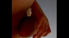 Hot guy takes big cock out of a tiny chastity and blows a thick white load of cum on his chest. Thumb