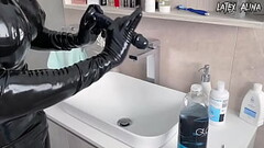 Latex Drone Secures Huge Dildo Inside Ass Thumb
