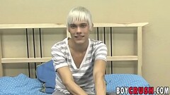 Young gay man playing with his dick during an interview Thumb