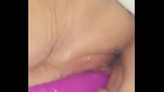 Squirting with purple dildo Thumb