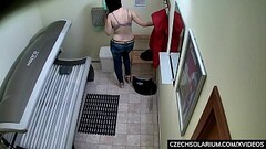 Busty MILF rubbing her pussy in Solarium Thumb