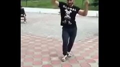 Russian dagestan arab guy is dancing amazing arabian dance in the street Thumb